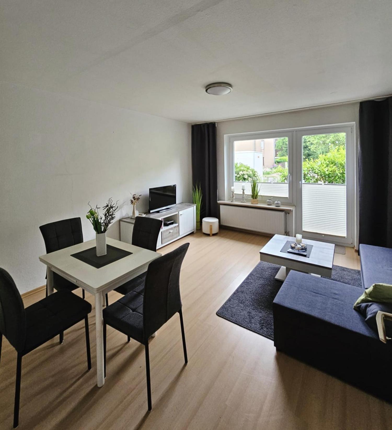 Haus Sommerwind-Ferienwohnungen mit Schwimmbad und Sauna in Büsum Habitación foto