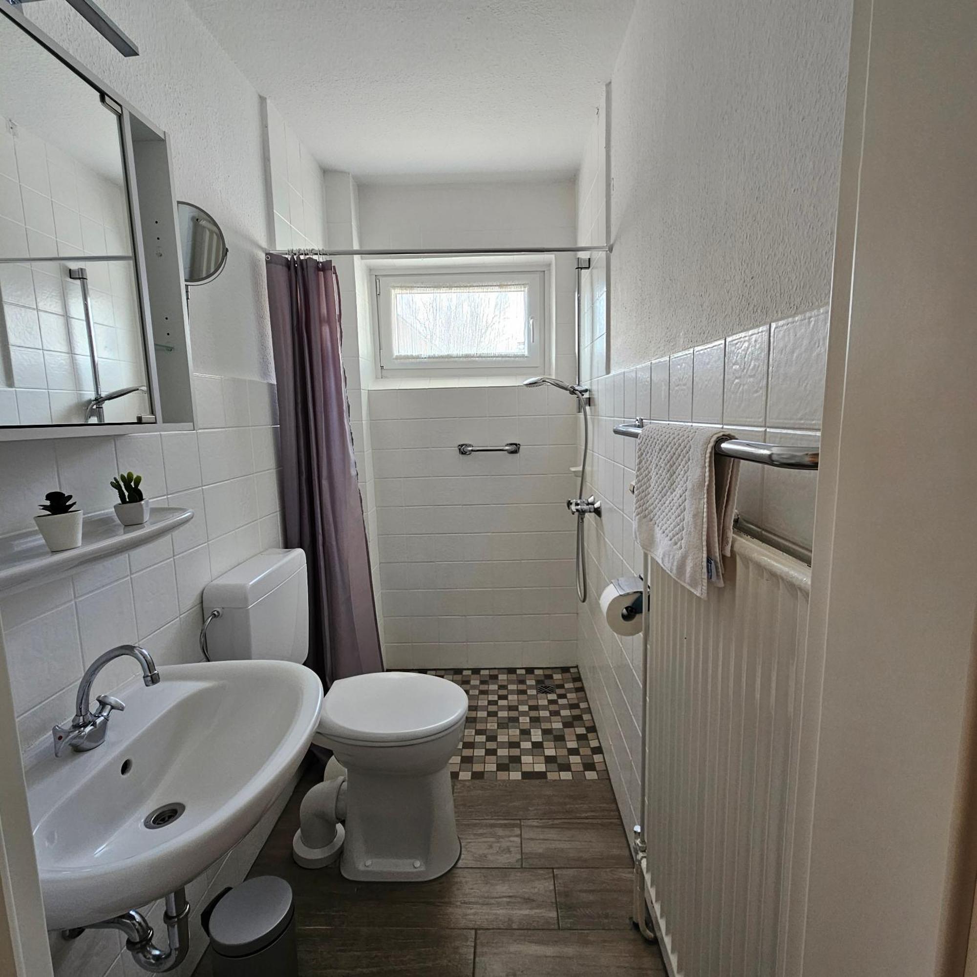 Haus Sommerwind-Ferienwohnungen mit Schwimmbad und Sauna in Büsum Habitación foto